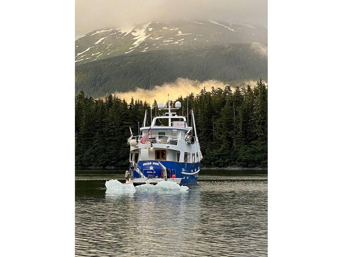 a boat on the water aboard BEAR PAW Yacht for Sale