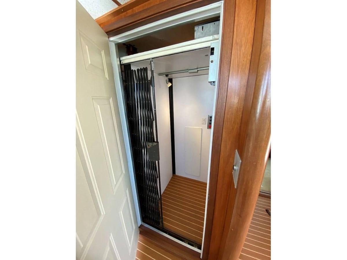 a hallway with a black curtain aboard BEAR PAW Yacht for Sale