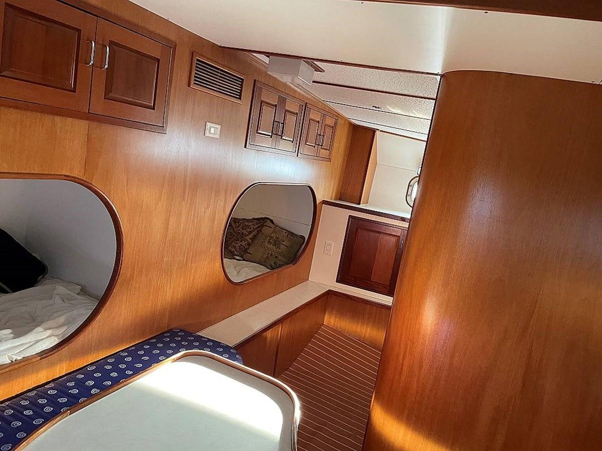 a wooden cabin with a sink and microwave aboard BEAR PAW Yacht for Sale