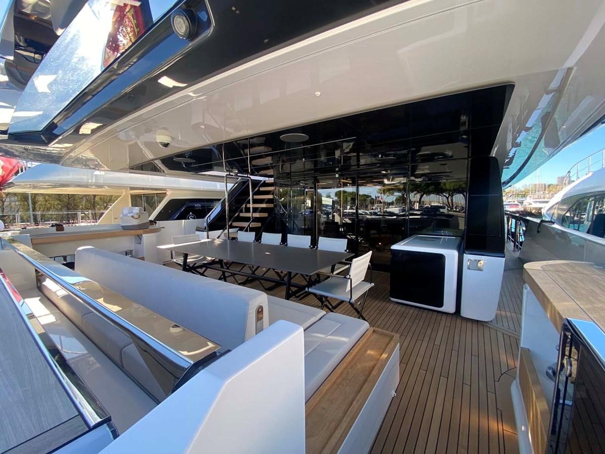 a room with a large deck and a pool table aboard AMORES Yacht for Sale
