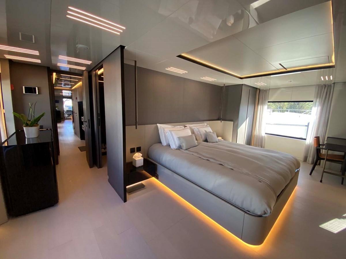 a room with a couch and a table aboard AMORES Yacht for Sale