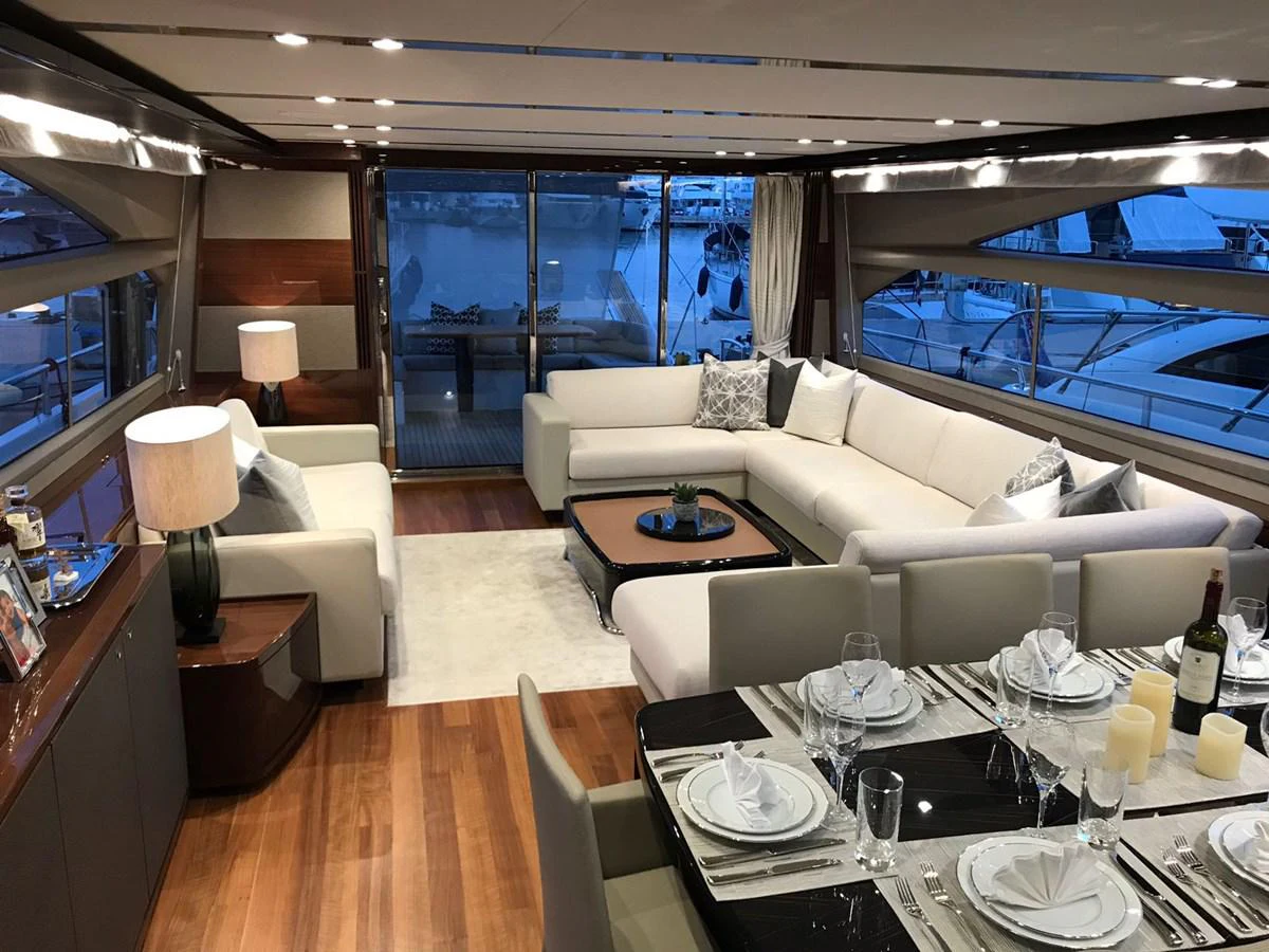 a living room with a large window aboard ANIKO Yacht for Sale