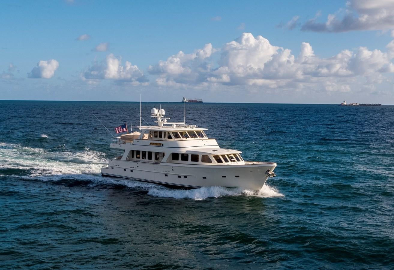 a white boat on the water aboard ANNIE Yacht for Sale