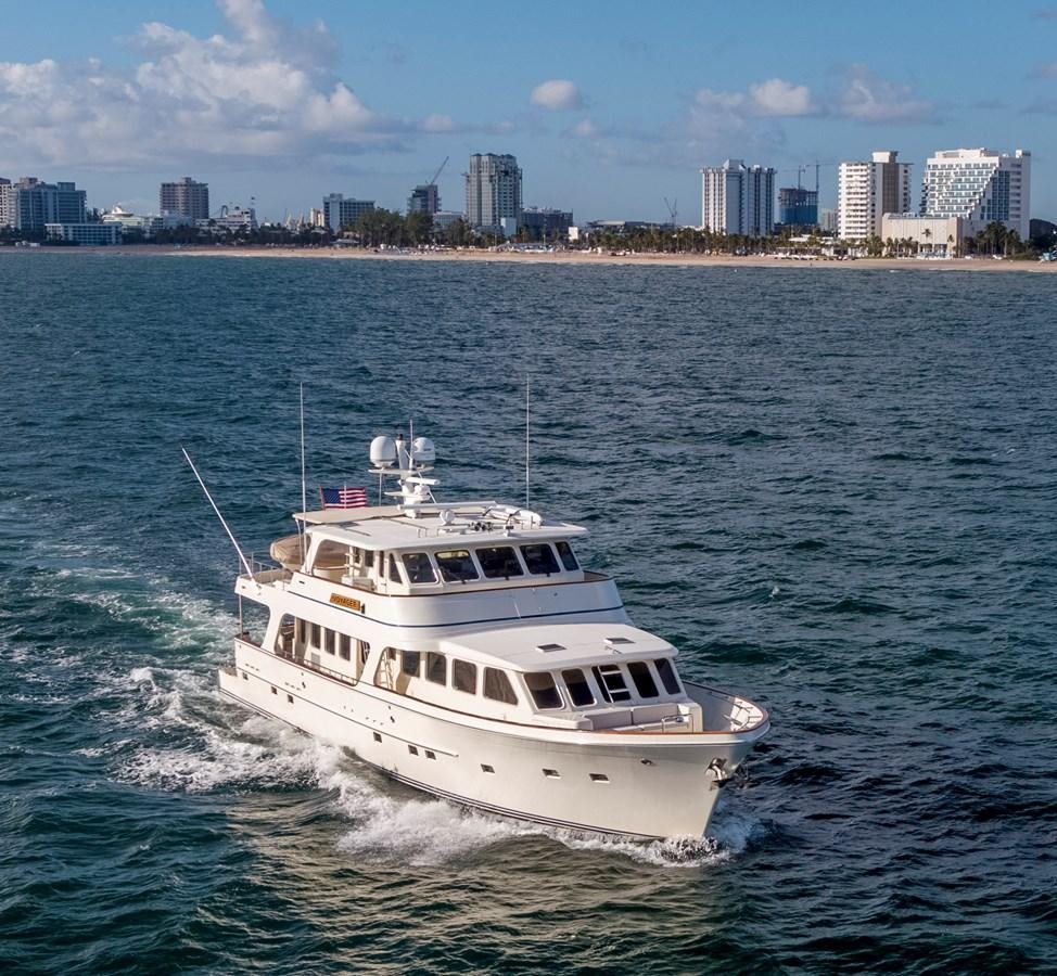a white boat on the water aboard ANNIE Yacht for Sale
