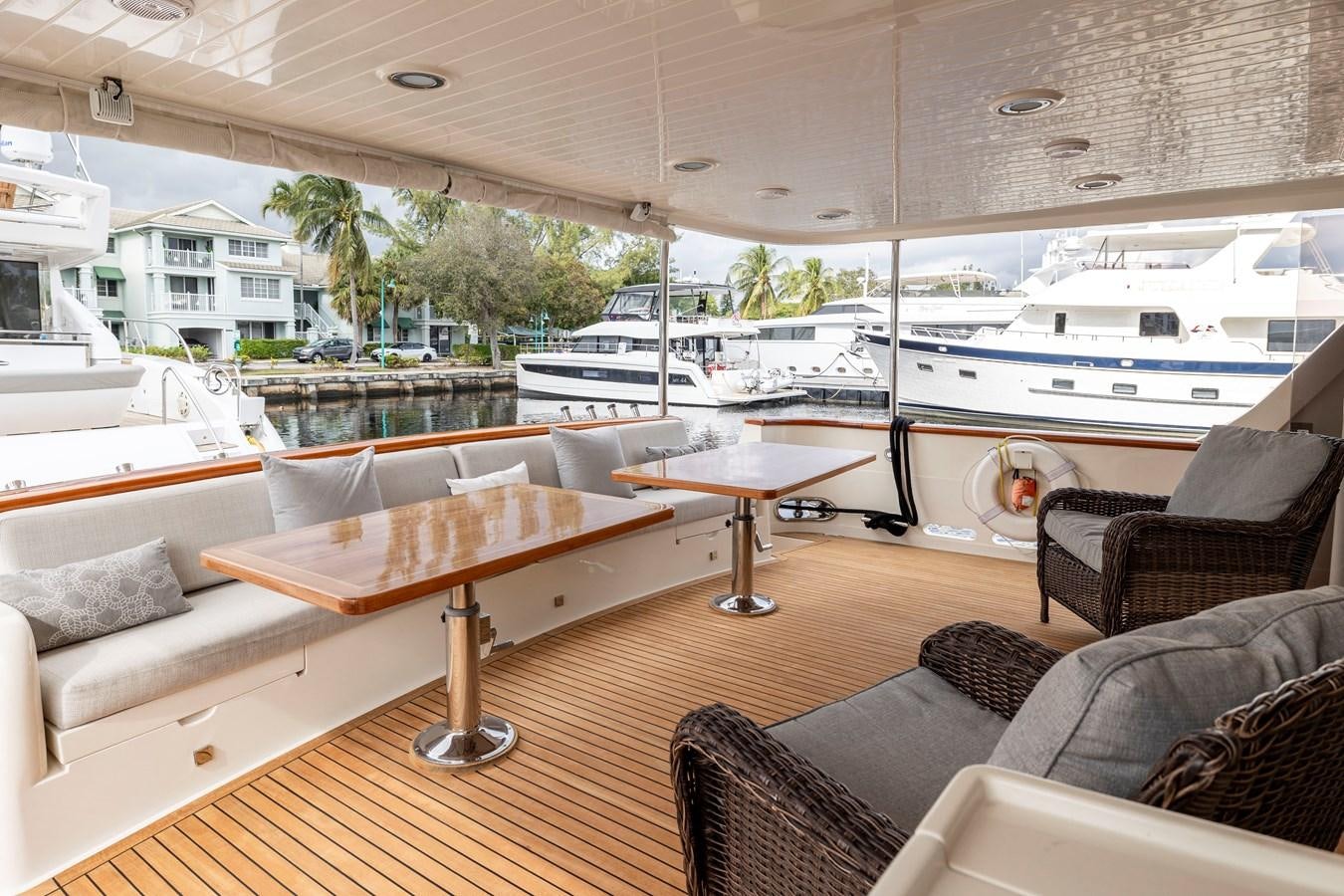 a living room with a large boat aboard ANNIE Yacht for Sale