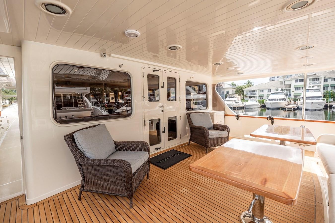a living room with a large window aboard ANNIE Yacht for Sale