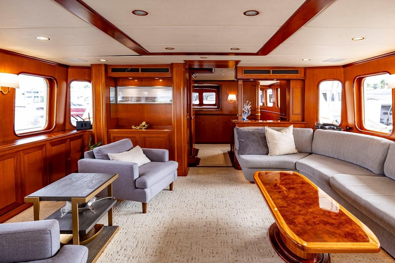 a living room with a couch and a table aboard ANNIE Yacht for Sale