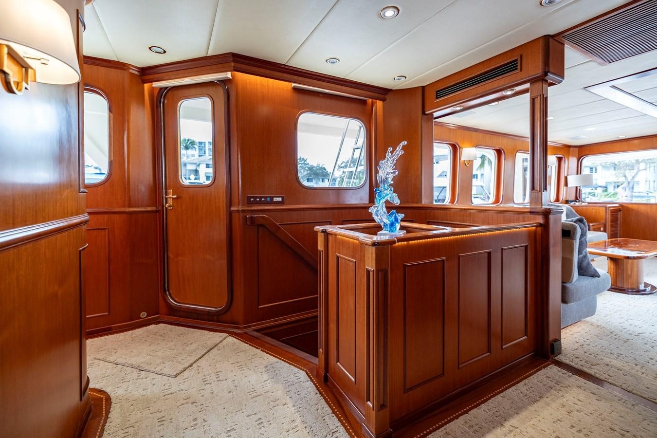 a wood cabinet in a room aboard ANNIE Yacht for Sale