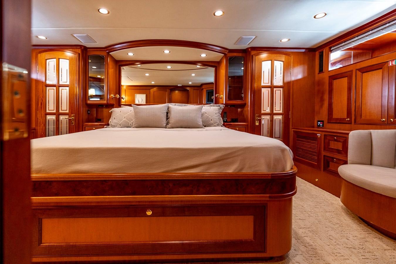 a large bed in a hotel room aboard ANNIE Yacht for Sale