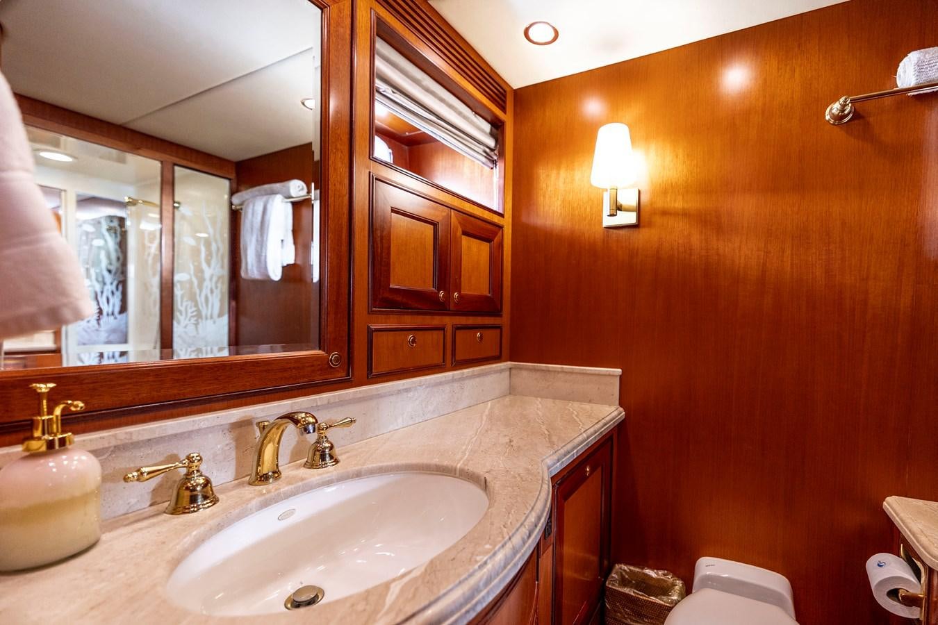 a bathroom with a sink and a mirror aboard ANNIE Yacht for Sale