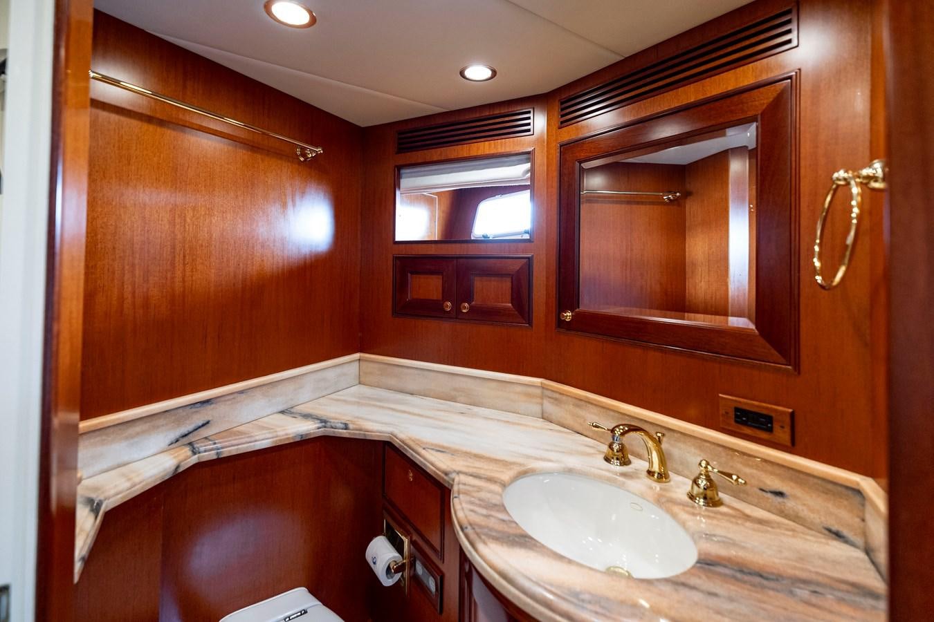 a bathroom with a sink and a mirror aboard ANNIE Yacht for Sale