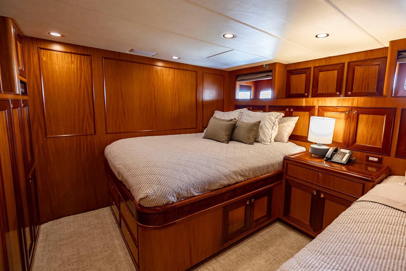a room with wooden cabinets aboard ANNIE Yacht for Sale