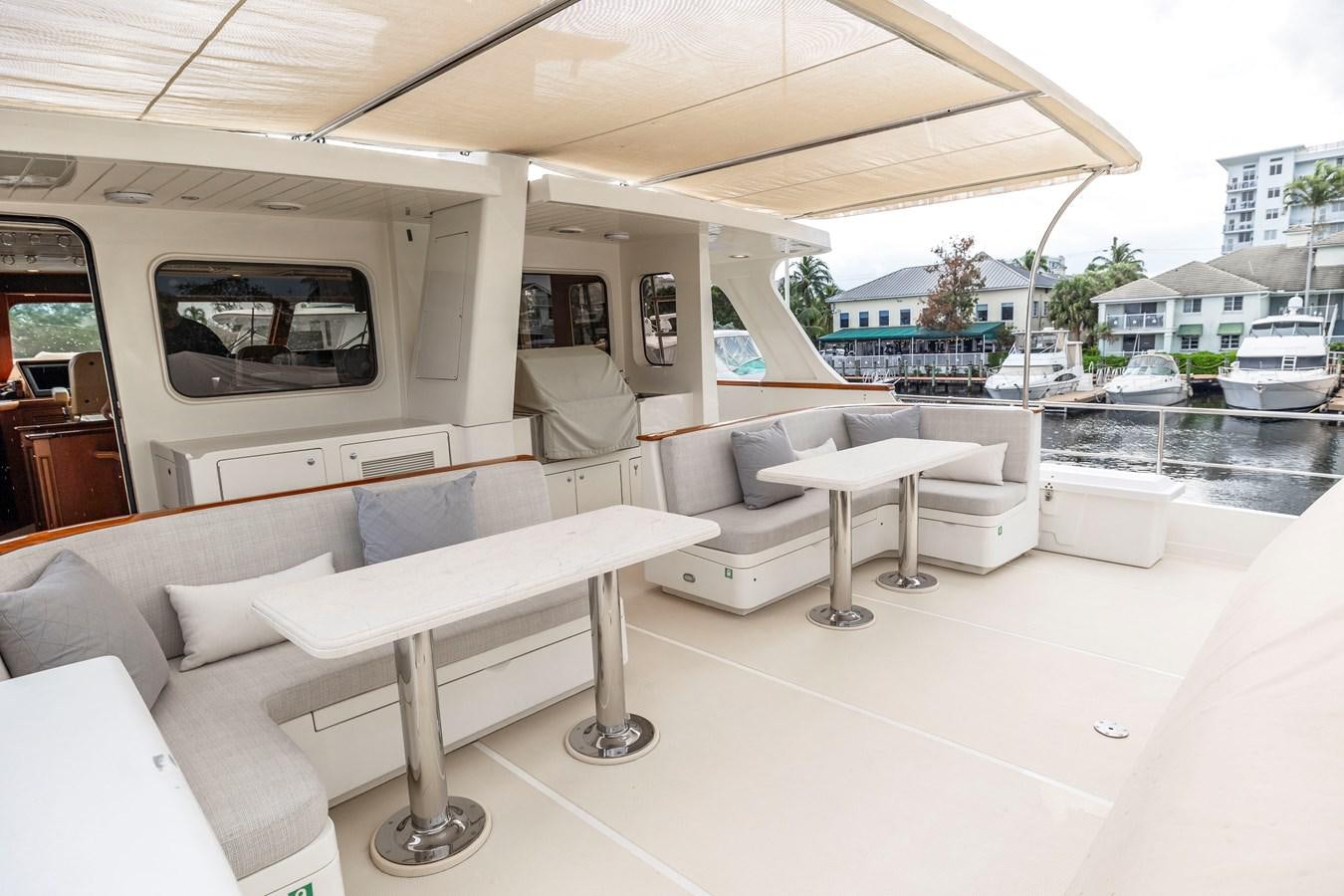 a room with a couch and a table aboard ANNIE Yacht for Sale