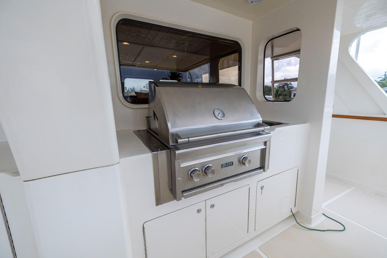 a white vehicle with a seat aboard ANNIE Yacht for Sale