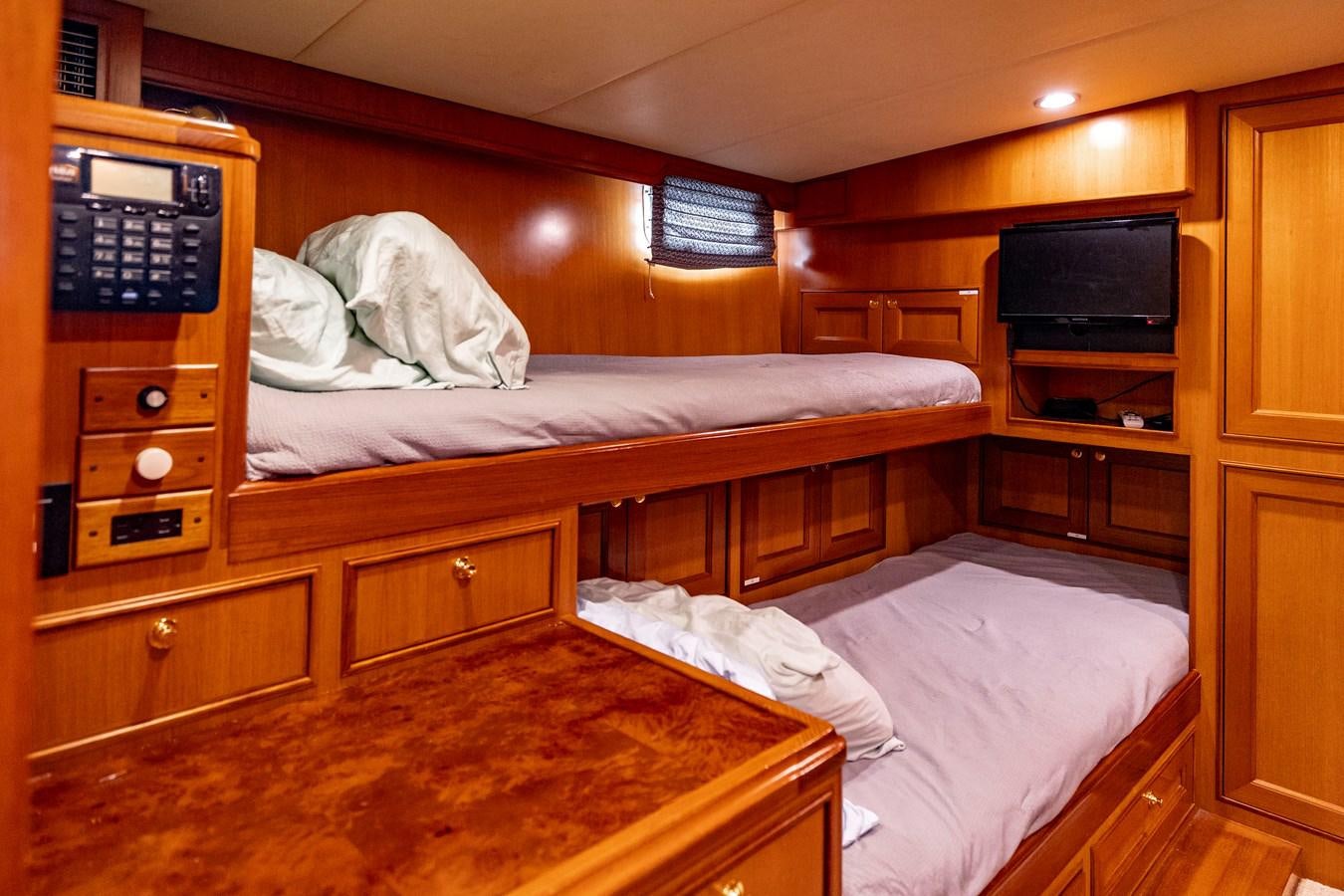 a room with two beds aboard ANNIE Yacht for Sale