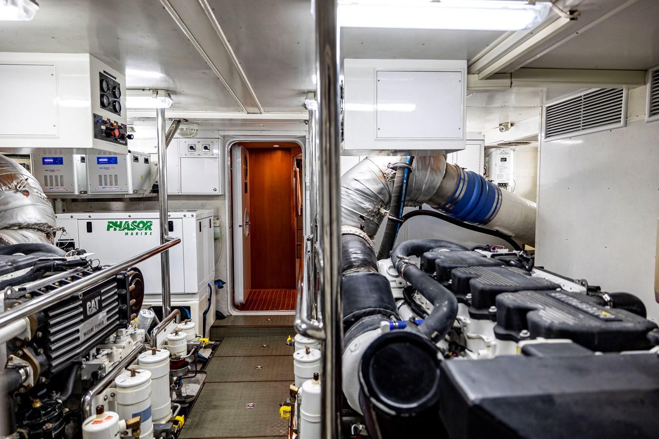 a person working in a room aboard ANNIE Yacht for Sale