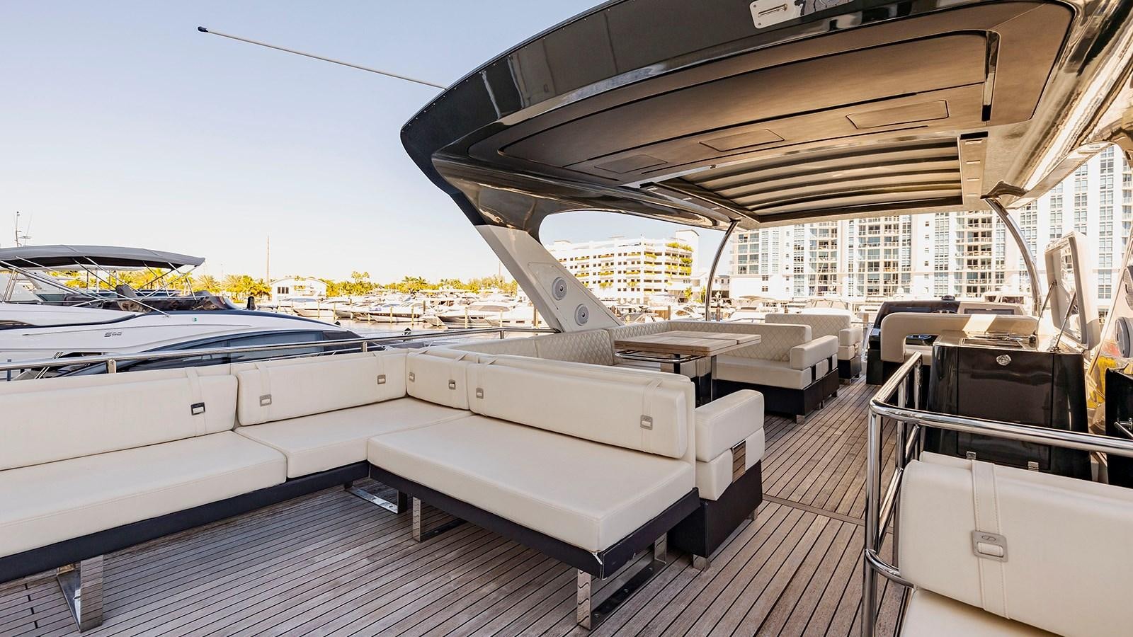 a room with a large bed aboard MON TON Yacht for Sale