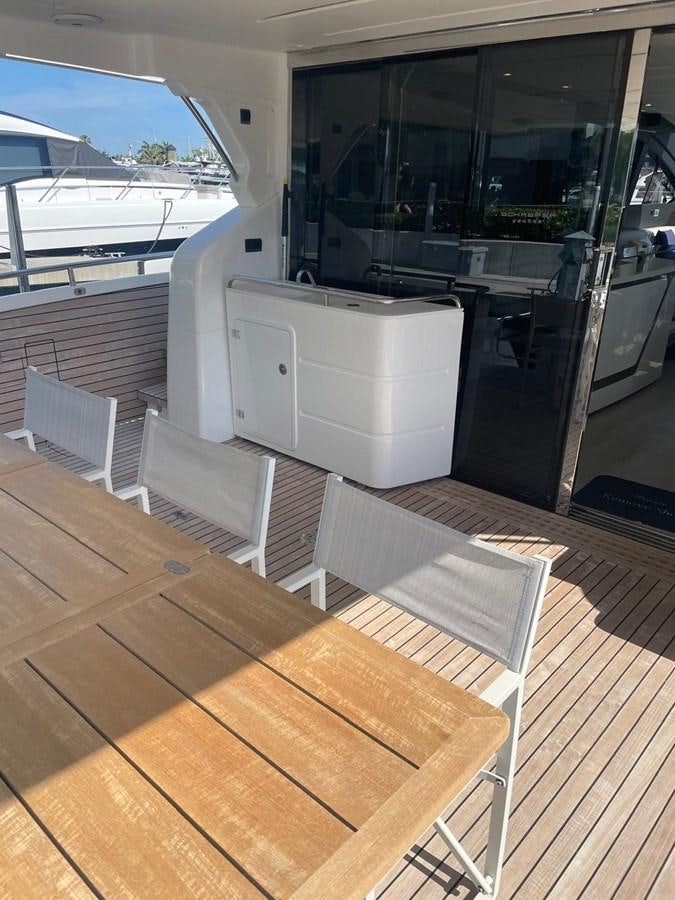 a deck with a large window aboard MON TON Yacht for Sale