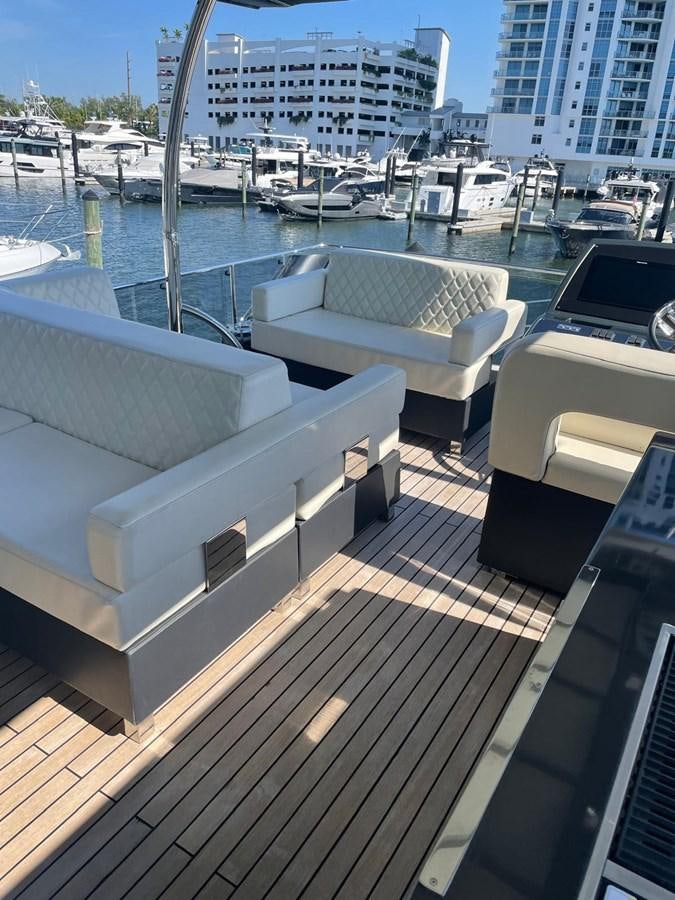 a deck with a deck and boats aboard MON TON Yacht for Sale