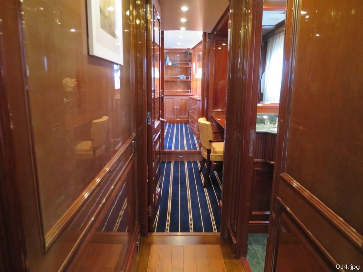 a hallway with wood doors aboard BLU Yacht for Sale