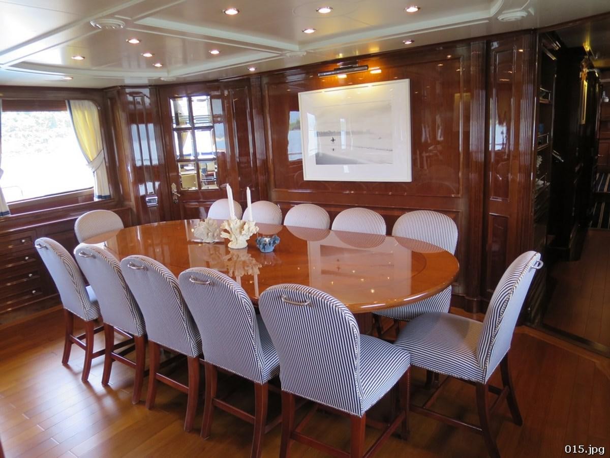 a conference room with tables and chairs aboard BLU Yacht for Sale