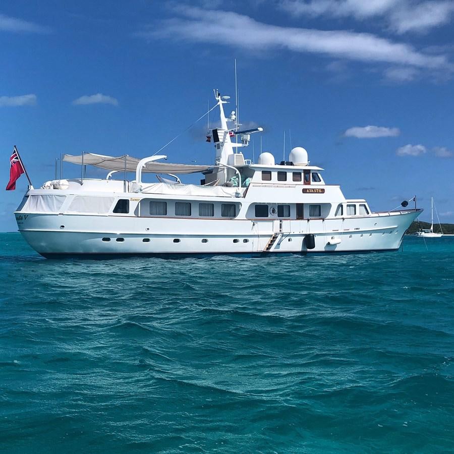 a white boat in the water aboard AVANTE V Yacht for Sale
