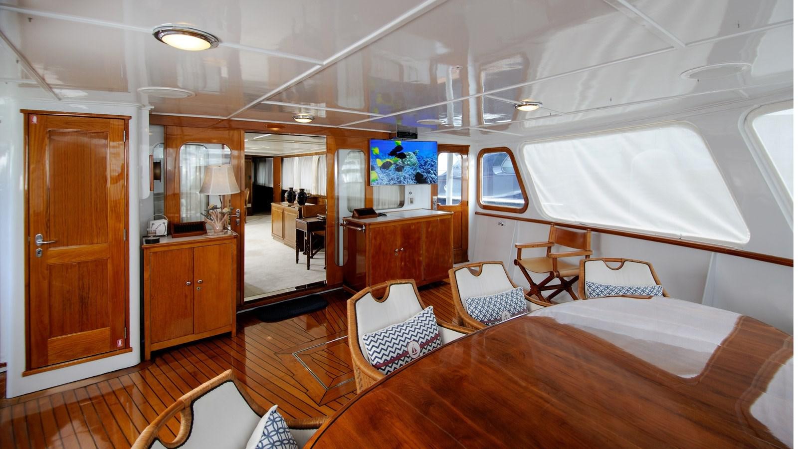 a bedroom with a bed and a desk aboard AVANTE V Yacht for Sale