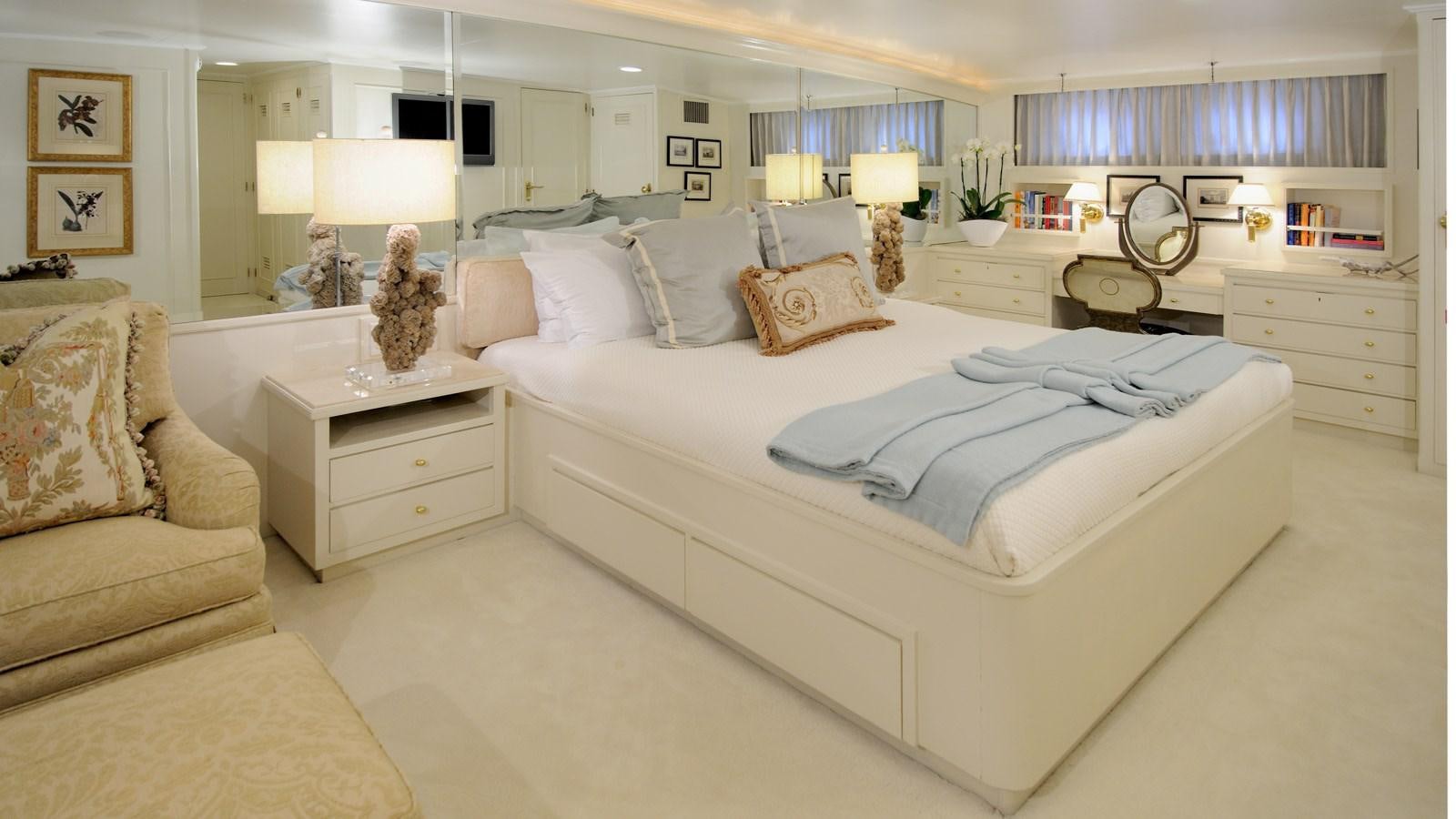 a large bed in a bedroom aboard AVANTE V Yacht for Sale