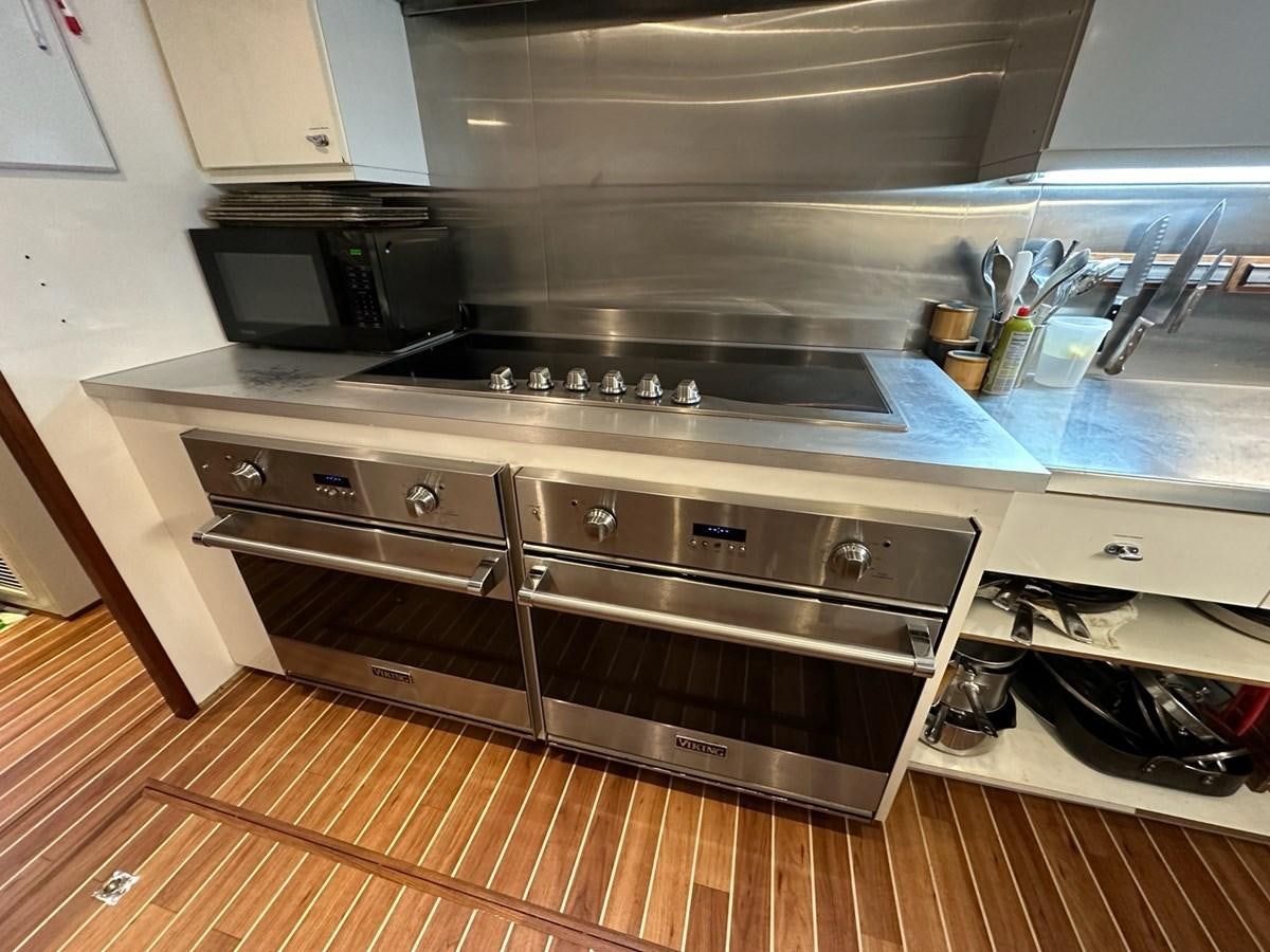 a stainless steel stove in a kitchen aboard AVANTE V Yacht for Sale