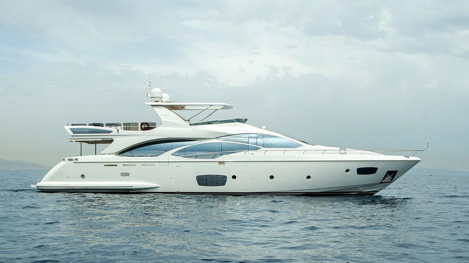 a white yacht in the water aboard KOUKLES Yacht for Sale