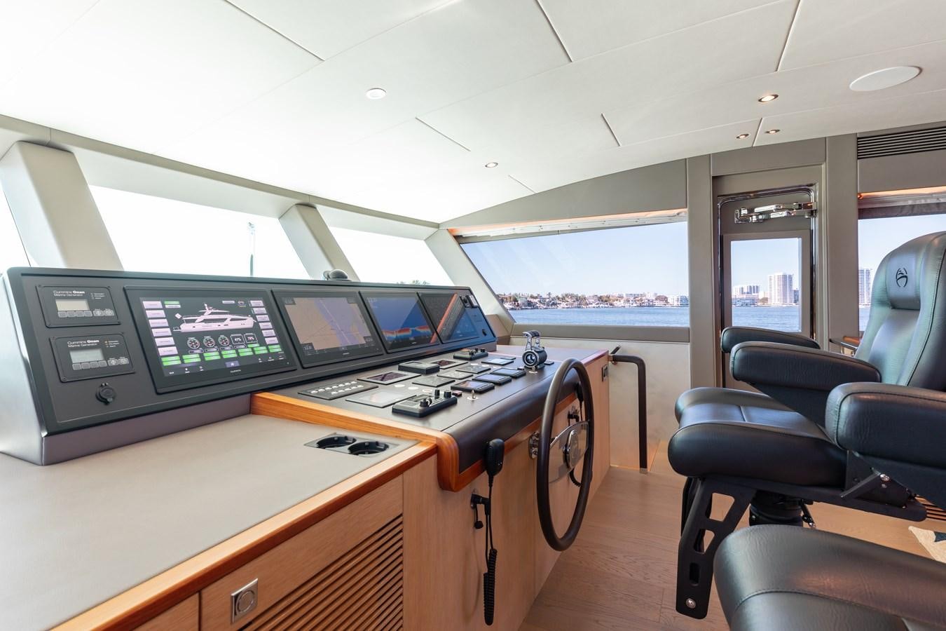 inside of a vehicle with computers aboard ONE MORE TIME Yacht for Sale