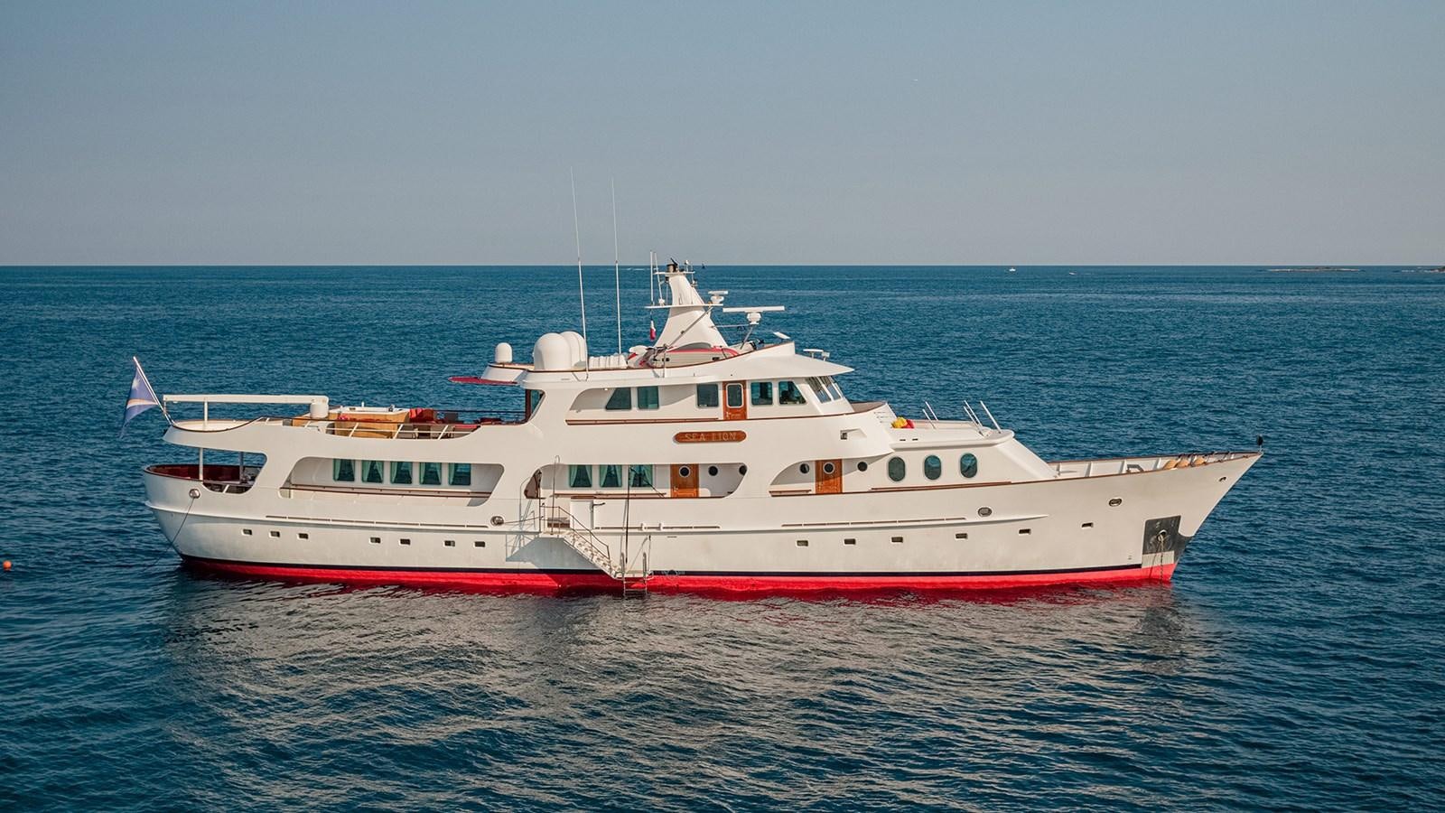 a large white boat in the water aboard SEA LION Yacht for Sale