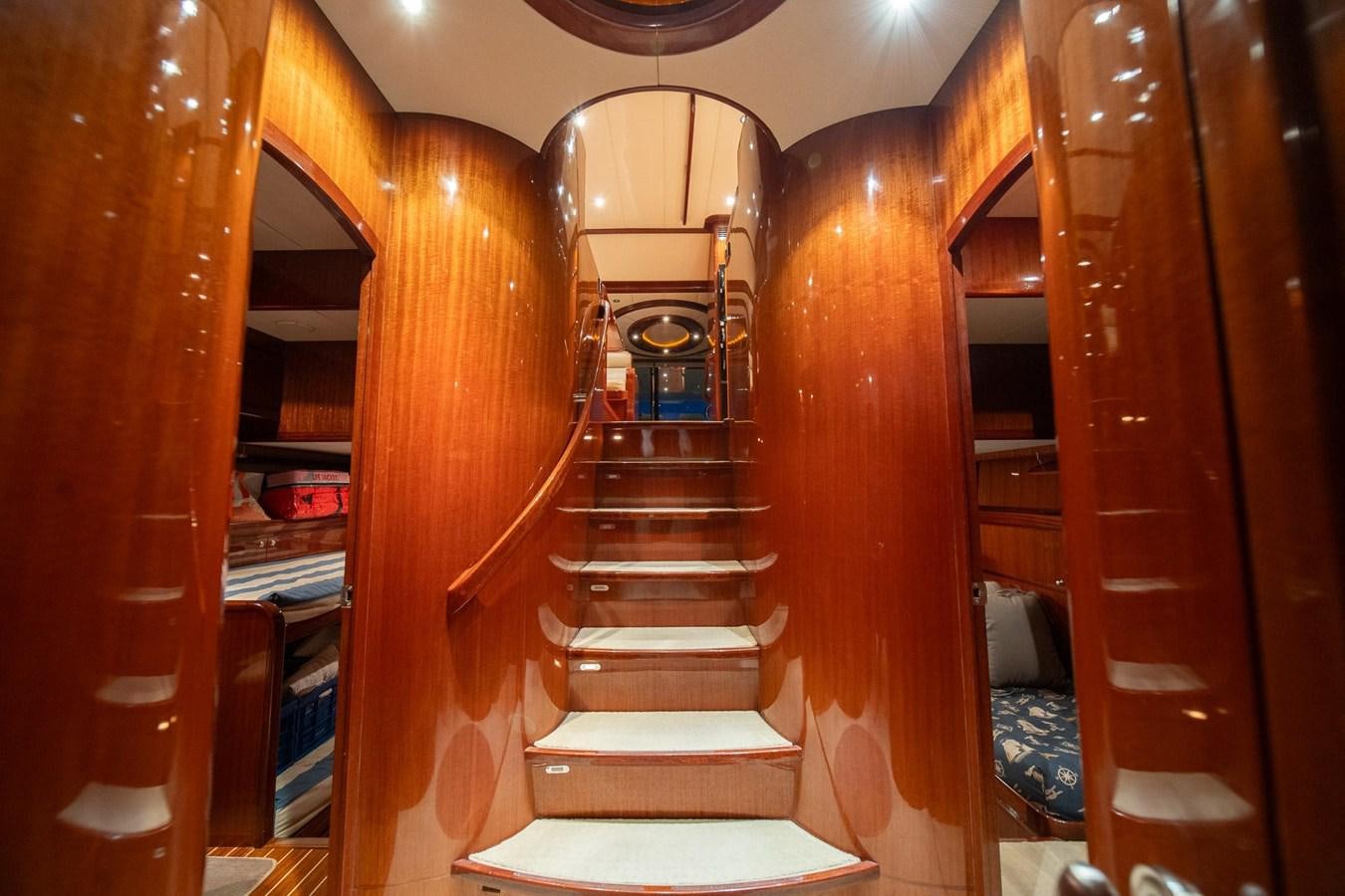 a staircase in a building aboard PRETTY PENNY Yacht for Sale