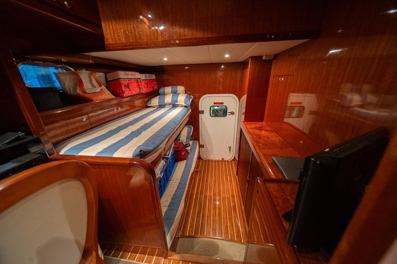 a room with bunk beds aboard PRETTY PENNY Yacht for Sale