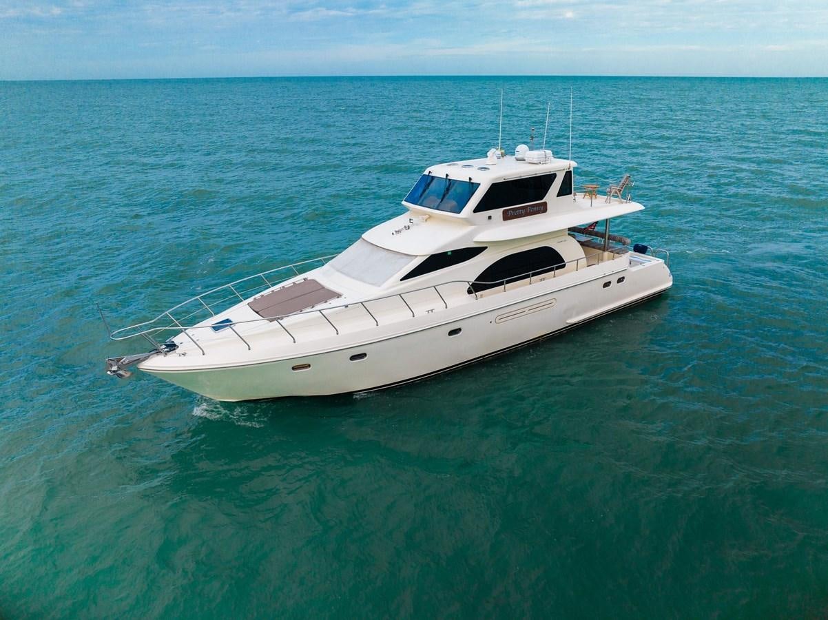 a white yacht in the ocean aboard PRETTY PENNY Yacht for Sale