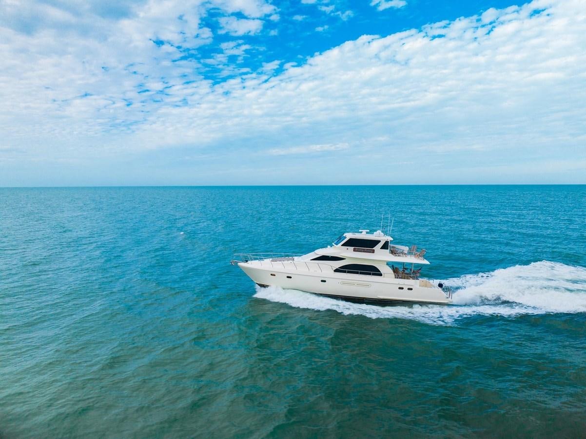 a white boat in the water aboard PRETTY PENNY Yacht for Sale