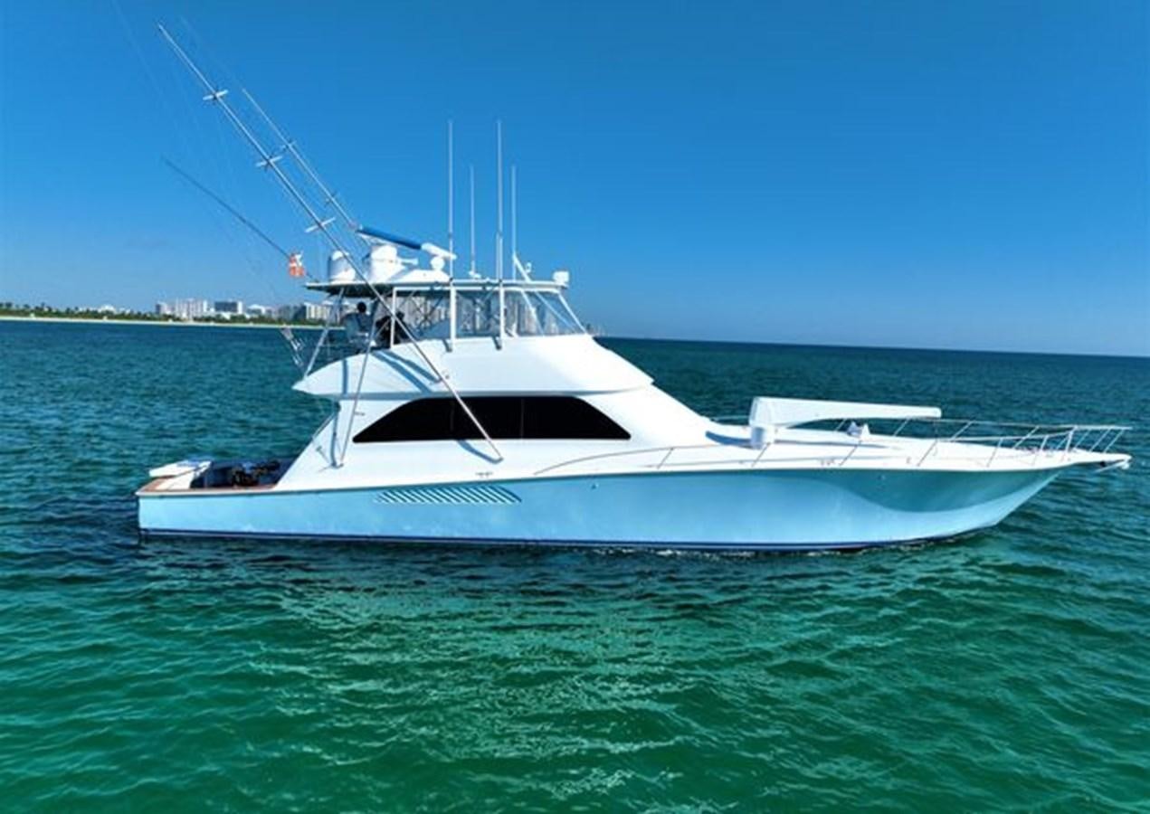 a white boat in the water aboard LIKE WHAT U SEA Yacht for Sale