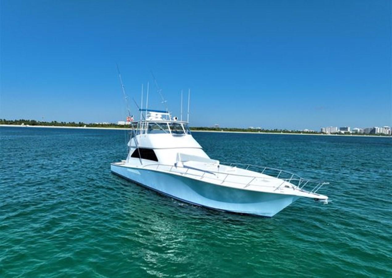 a white boat in the water aboard LIKE WHAT U SEA Yacht for Sale