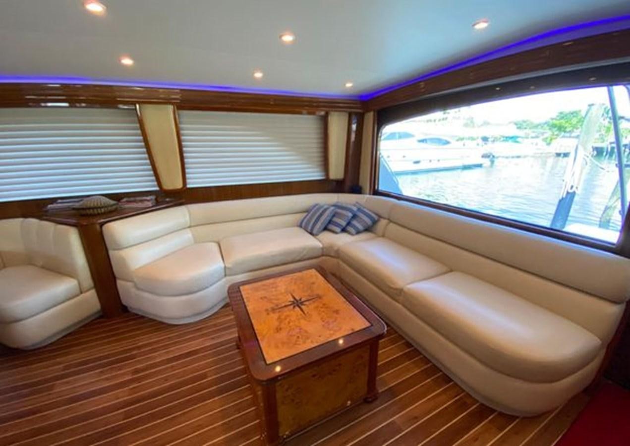 a room with a couch and a table aboard LIKE WHAT U SEA Yacht for Sale