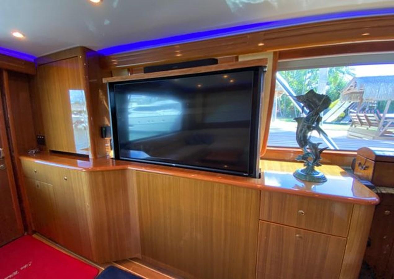 a tv on a cabinet aboard LIKE WHAT U SEA Yacht for Sale