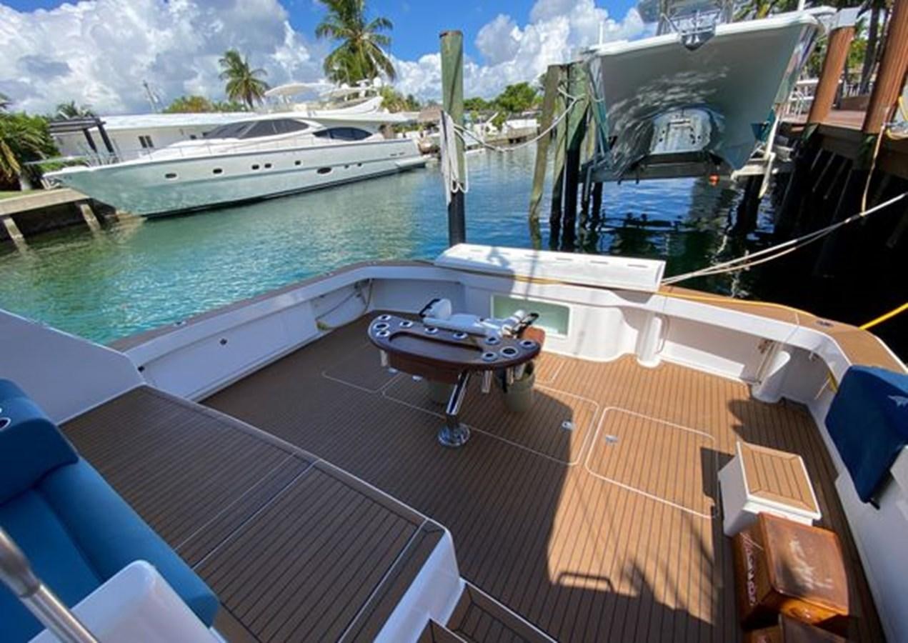 a boat docked at a pier aboard LIKE WHAT U SEA Yacht for Sale
