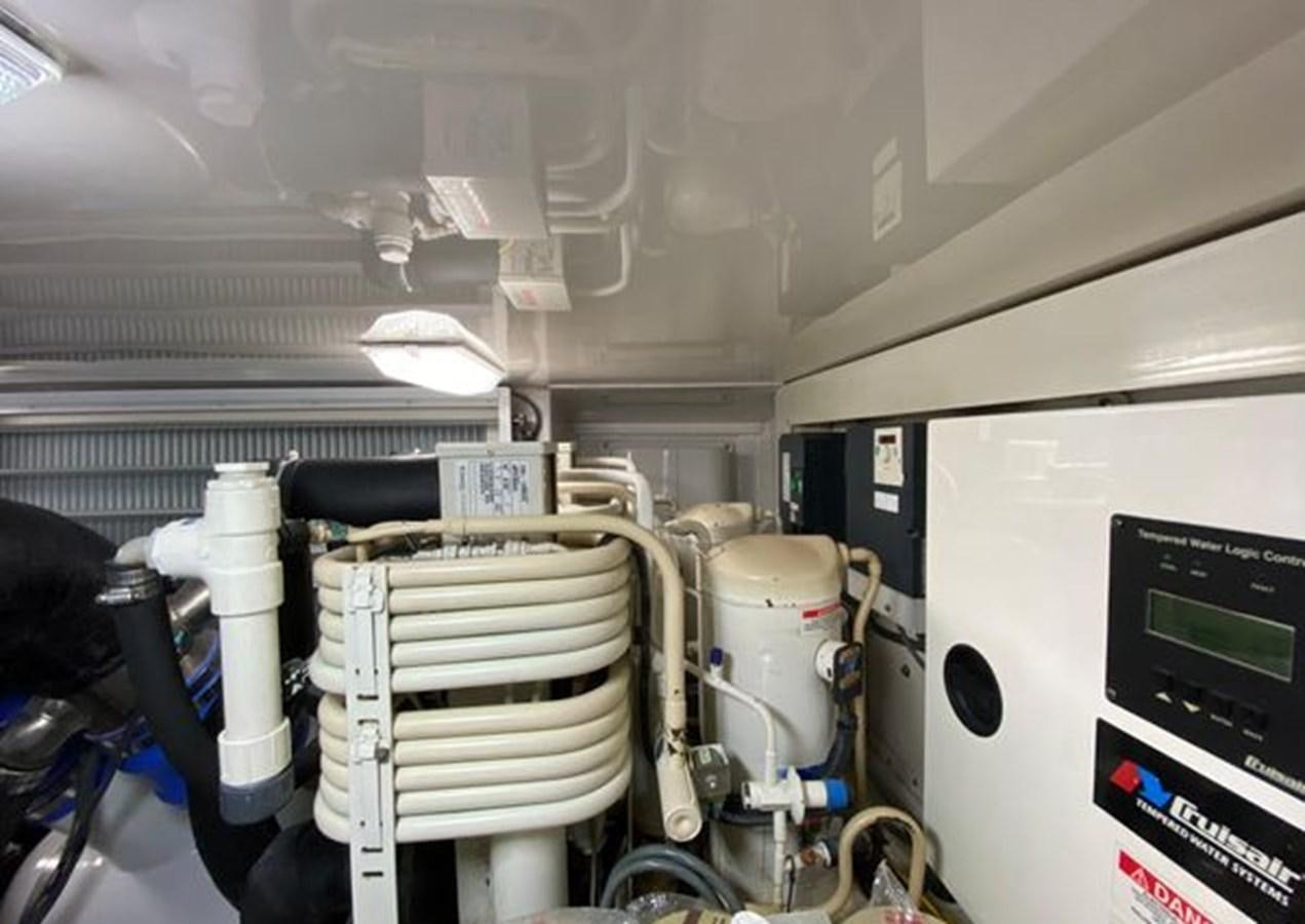 a room with a machine and a machine aboard LIKE WHAT U SEA Yacht for Sale