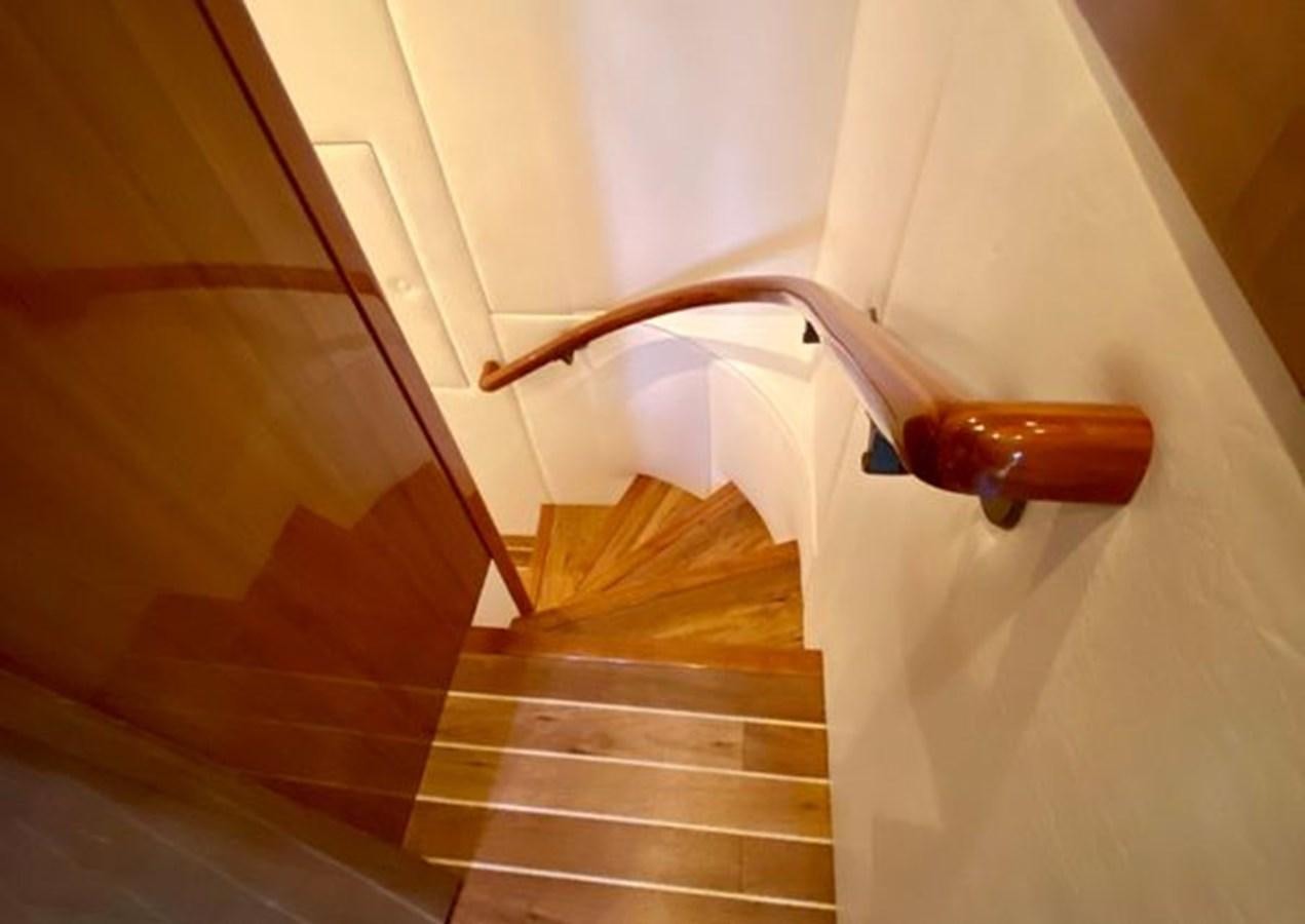 a wooden door with a handle aboard LIKE WHAT U SEA Yacht for Sale