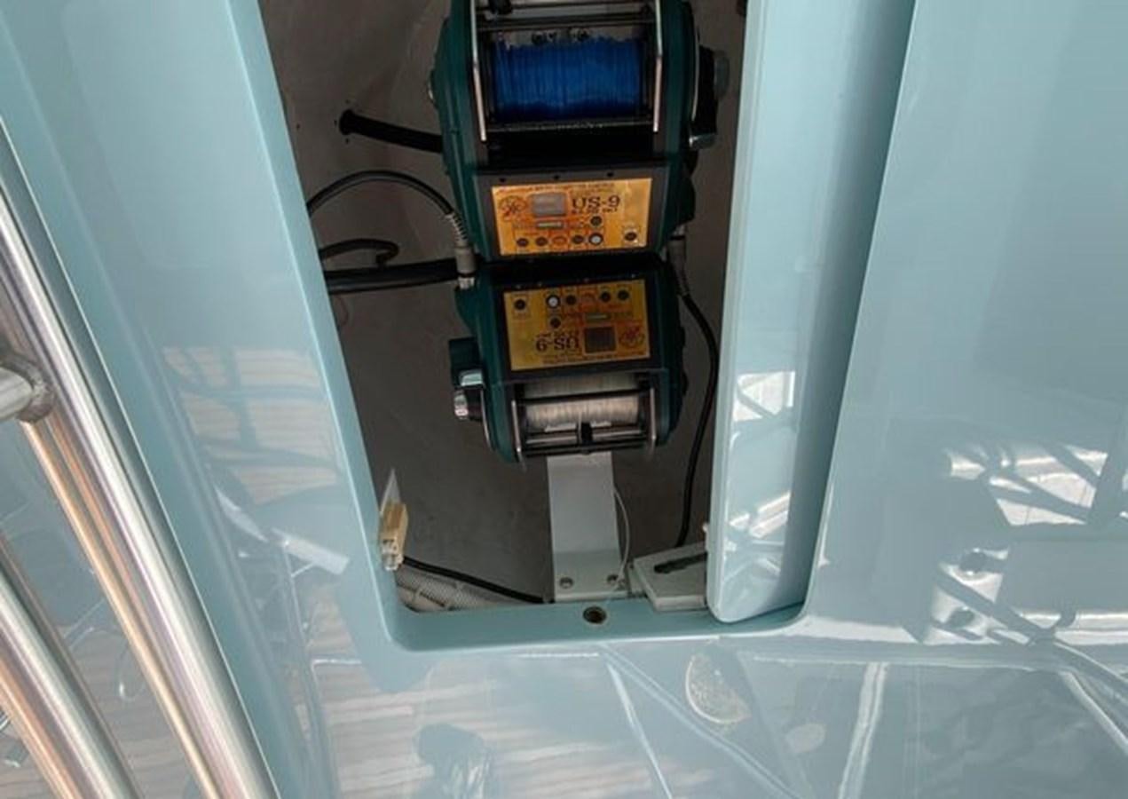 a computer tower with wires aboard LIKE WHAT U SEA Yacht for Sale