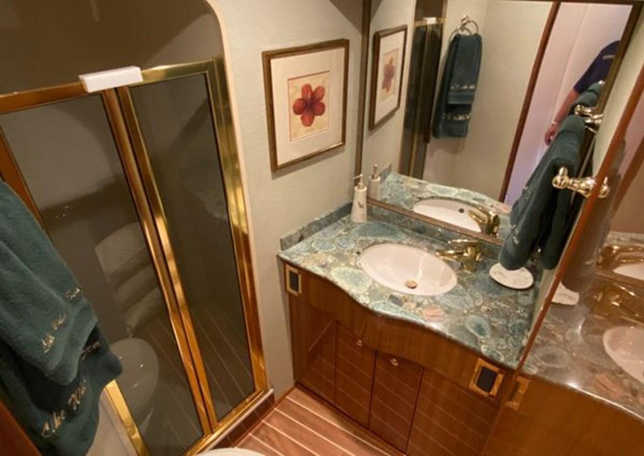 a bathroom with a marble counter top aboard LIKE WHAT U SEA Yacht for Sale
