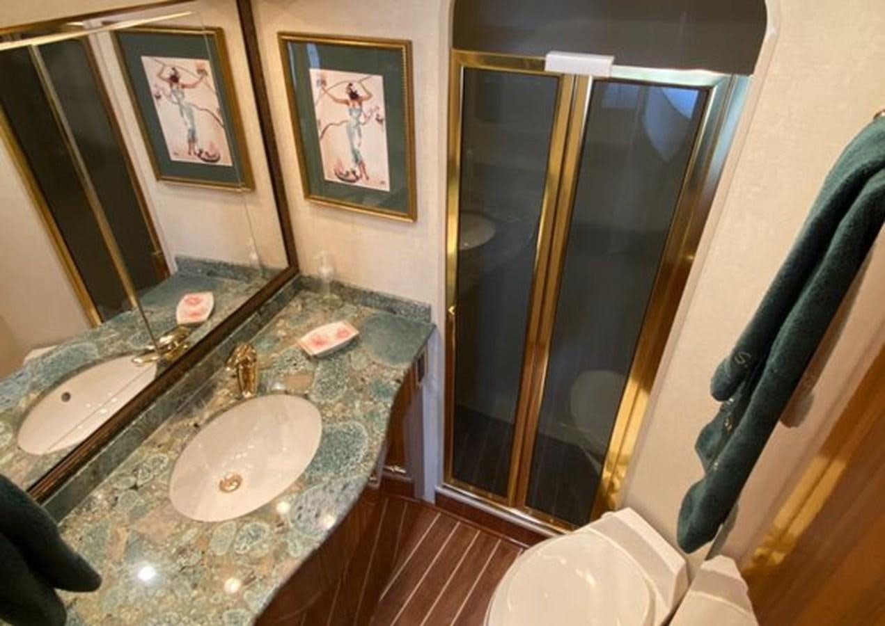 a bathroom with a marble counter top aboard LIKE WHAT U SEA Yacht for Sale