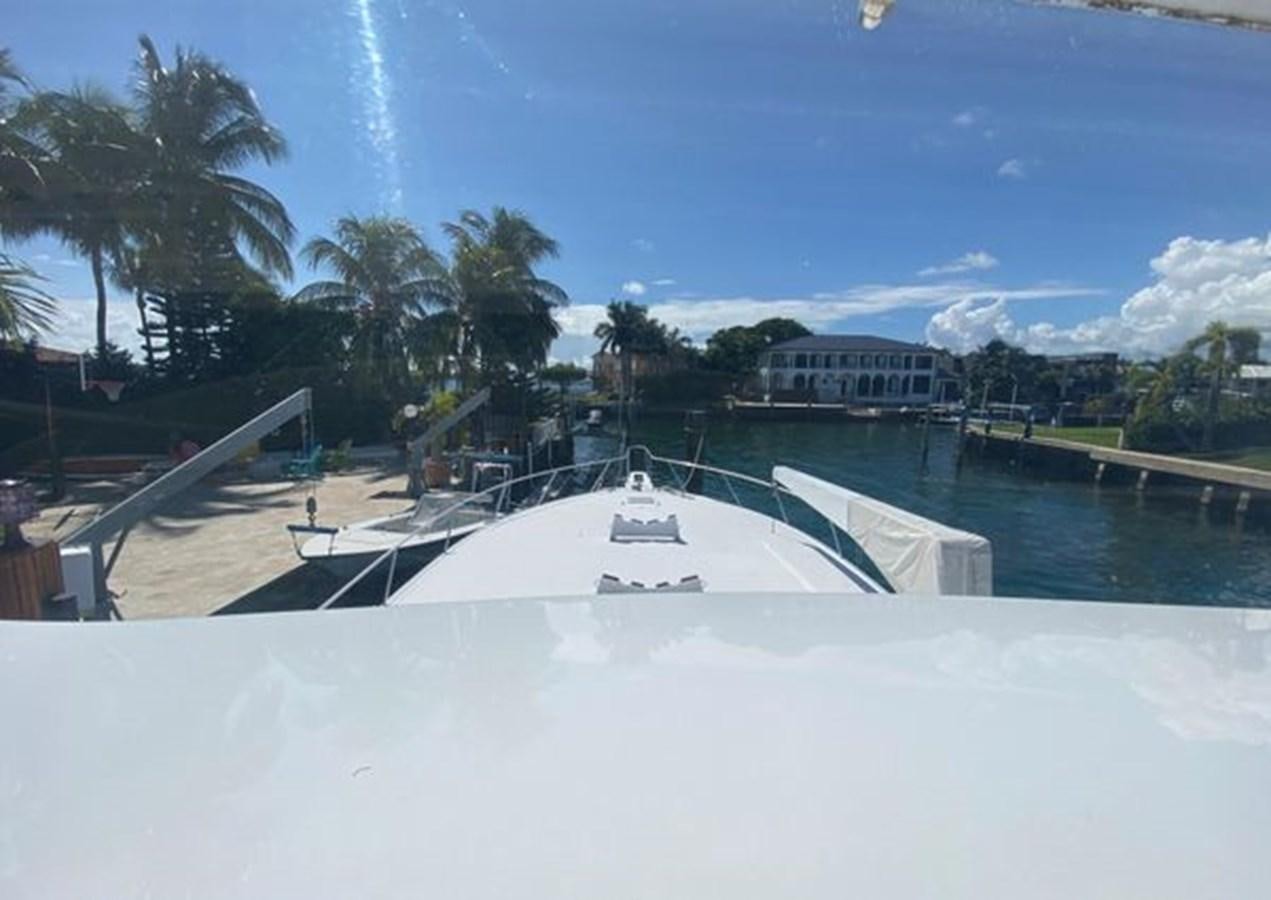 a pool with a building in the background aboard LIKE WHAT U SEA Yacht for Sale
