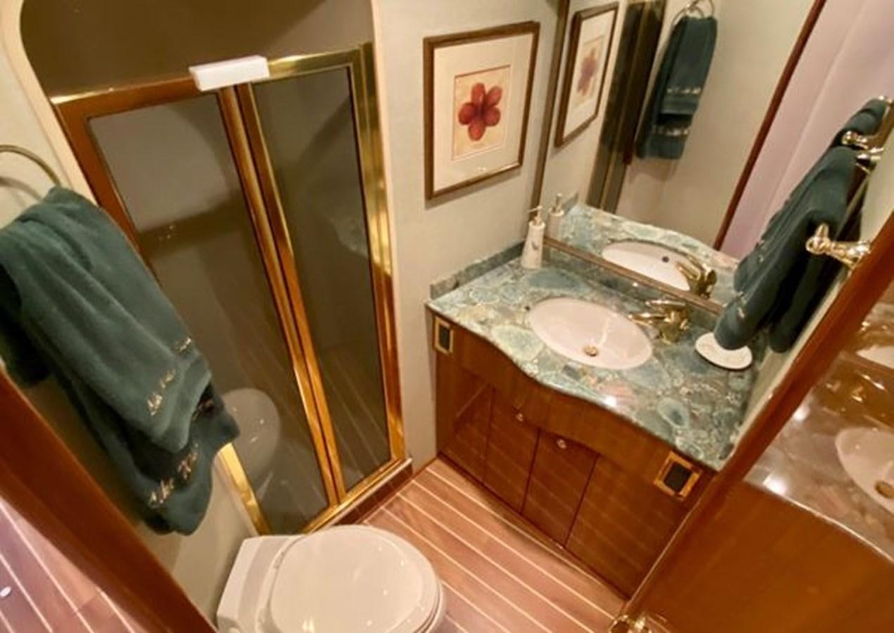 a bathroom with a marble counter top aboard LIKE WHAT U SEA Yacht for Sale