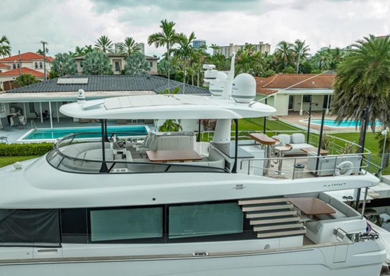 a large white boat with a deck aboard AZIMUT MAGELLANO 30/15 Yacht for Sale
