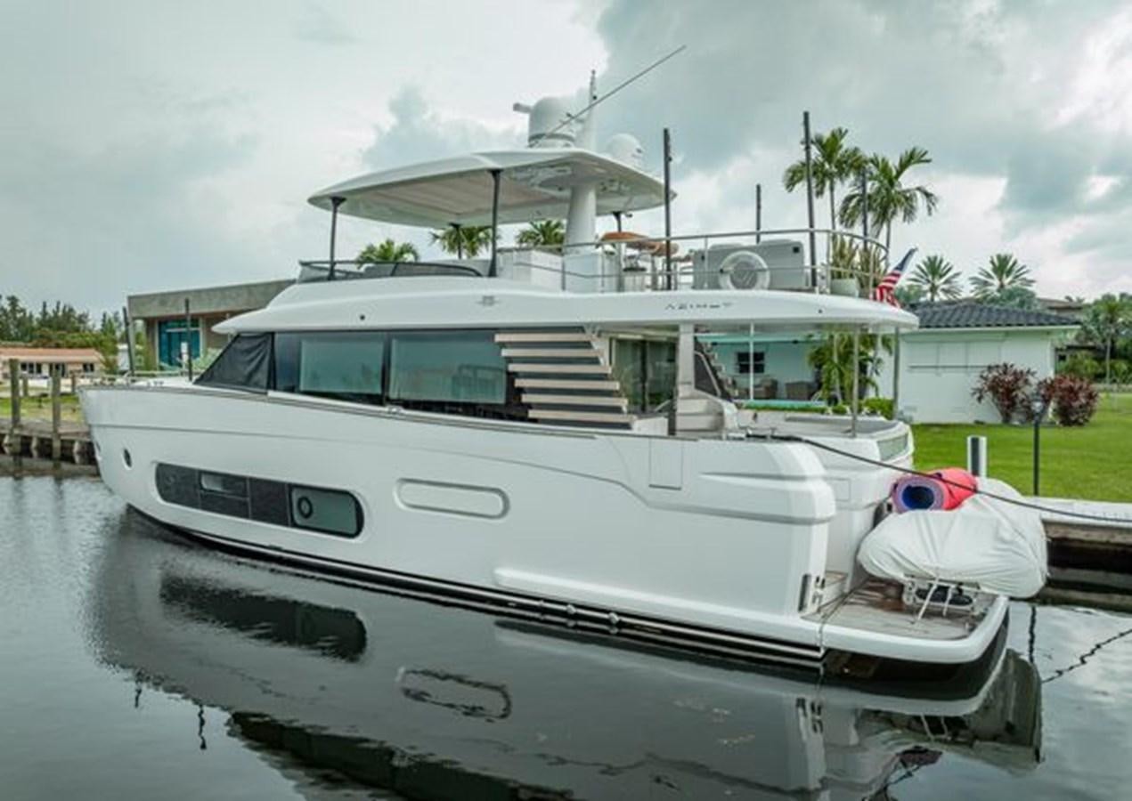 a white boat docked aboard AZIMUT MAGELLANO 30/15 Yacht for Sale